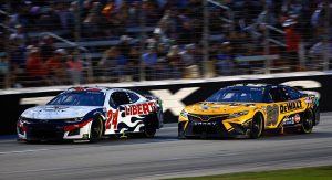 William Byron's No. 24 Chevrolet battles close to Christopher Bell's No. 20 Toyota at Texas Motor Speedway