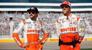 Chase Elliott and No. 9 crew chief Alan Gustafson stand side by side on the Las Vegas Motor Speedway pre-race grid