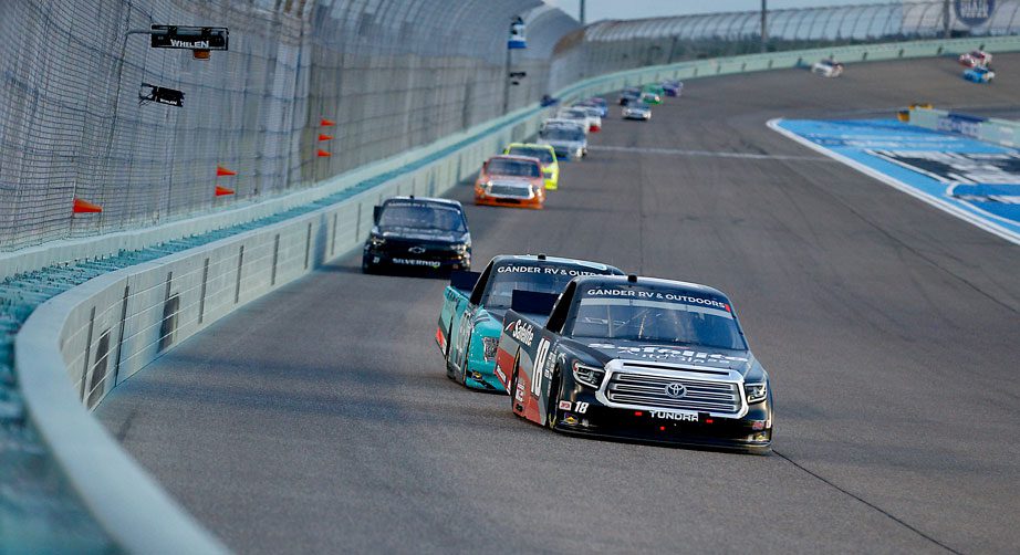 Trucks race into Turn 1 at Homestead-Miami Speedway