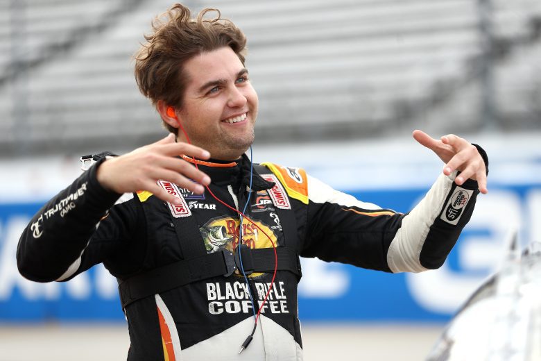MARTINSVILLE, VIRGINIA - OCTOBER 28: Noah Gragson, driver of the #9 Bass Pro Shops/TrueTimber/BRCC Chevrolet, gestures on the grid during practice for the NASCAR Xfinity Series Dead On Tools 250 at Martinsville Speedway on October 28, 2022 in Martinsville, Virginia. (Photo by Mike Mulholland/Getty Images) | Getty Images