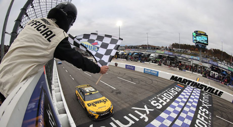 Christopher Bell crosses checkered flag