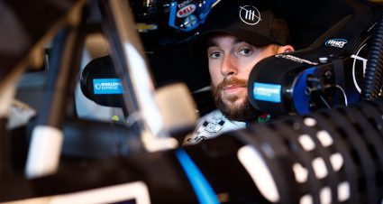 Ross Chastain waits in the No. 1 Chevy in the Phoenix Raceway garage