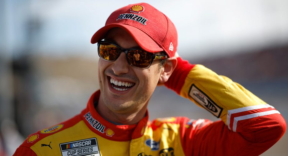 Joey Logano flashes a big grin to the camera