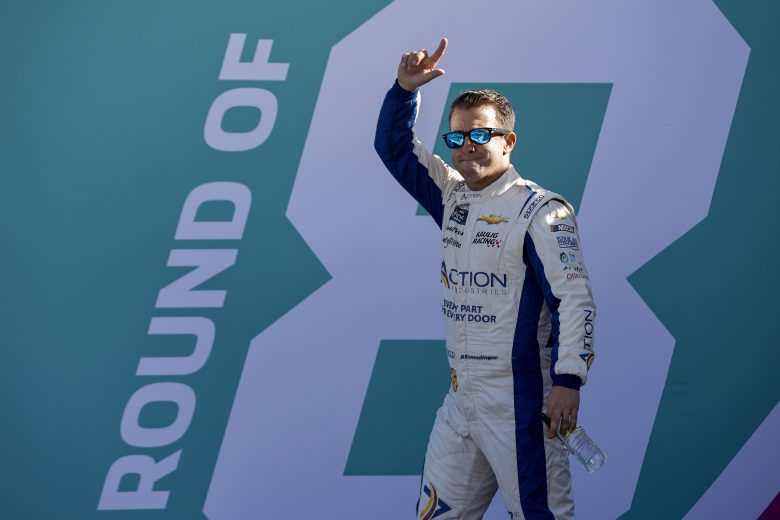 HOMESTEAD, FLORIDA - OCTOBER 22: AJ Allmendinger, driver of the #16 Action Industries Chevrolet, waves to fans as he walks onstage during driver intros prior to the NASCAR Xfinity Series Contender Boats 300 at Homestead-Miami Speedway on October 22, 2022 in Homestead, Florida. (Photo by Sean Gardner/Getty Images) | Getty Images