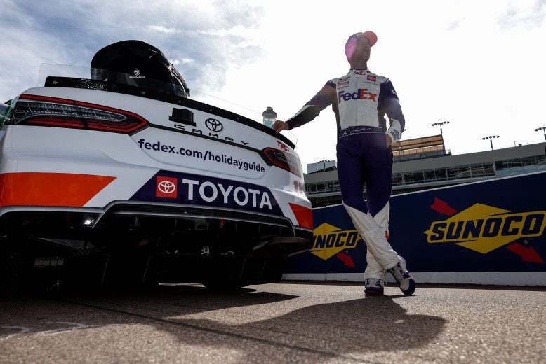 AVONDALE, ARIZONA - NOVEMBER 05: Denny Hamlin, driver of the #11 FedEx Express Toyota, waits on the grid during qualifying for the NASCAR Cup Series Championship at Phoenix Raceway on November 05, 2022 in Avondale, Arizona. (Photo by Christian Petersen/Getty Images) | Getty Images