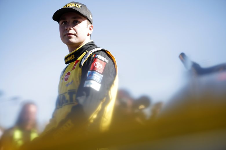 AVONDALE, ARIZONA - NOVEMBER 06: Christopher Bell, driver of the #20 DeWalt Toyota, waits on the grid prior to the NASCAR Cup Series Championship at Phoenix Raceway on November 06, 2022 in Avondale, Arizona. (Photo by Chris Graythen/Getty Images) | Getty Images