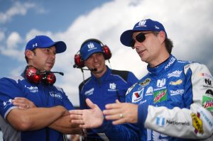 From left: Crew chief Chad Knaus, crew chief Greg Ives and Jeff Gordon talk at Pocono Raceway