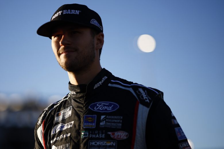 AVONDALE, ARIZONA - NOVEMBER 04: Todd Gilliland, driver of the #38 Boot Barn Ford, waits in the garage area during practice for the NASCAR Cup Series Championship at Phoenix Raceway on November 04, 2022 in Avondale, Arizona. (Photo by Chris Graythen/Getty Images) | Getty Images
