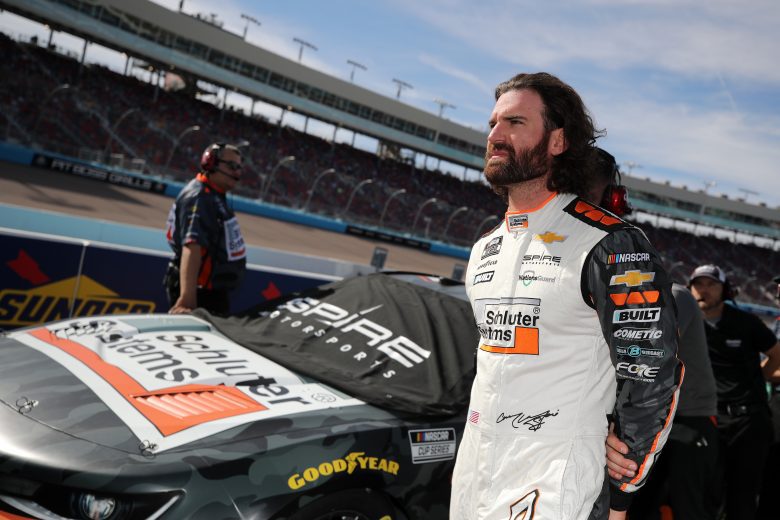 AVONDALE, ARIZONA - NOVEMBER 05: Corey LaJoie, driver of the #7 Schluter Systems Chevrolet, walks the grid during qualifying for the NASCAR Cup Series Championship at Phoenix Raceway on November 05, 2022 in Avondale, Arizona. (Photo by Meg Oliphant/Getty Images) | Getty Images