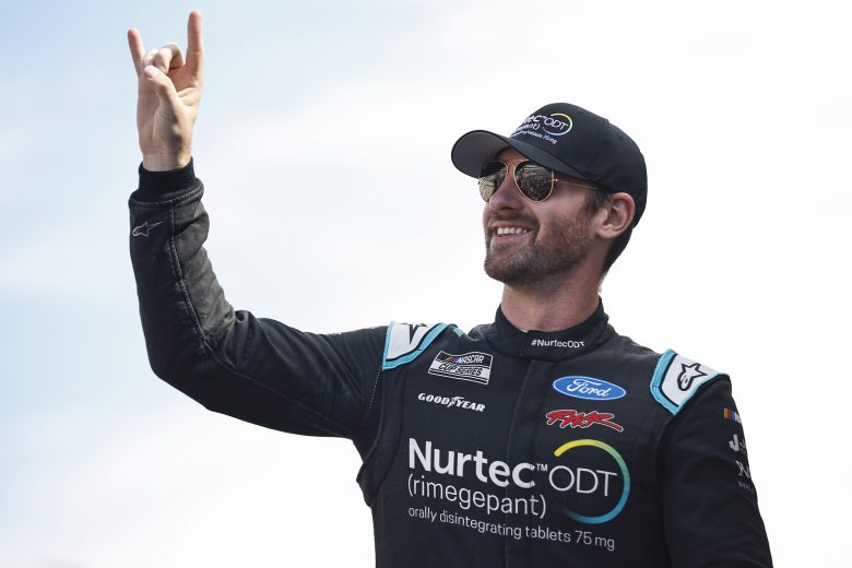 LAS VEGAS, NEVADA - OCTOBER 16: Cody Ware, driver of the #51 Nurtec ODT UBCF Ford, waves to fans as he walks onstage during driver intros prior to the NASCAR Cup Series South Point 400 at Las Vegas Motor Speedway on October 16, 2022 in Las Vegas, Nevada. (Photo by Sean Gardner/Getty Images) | Getty Images