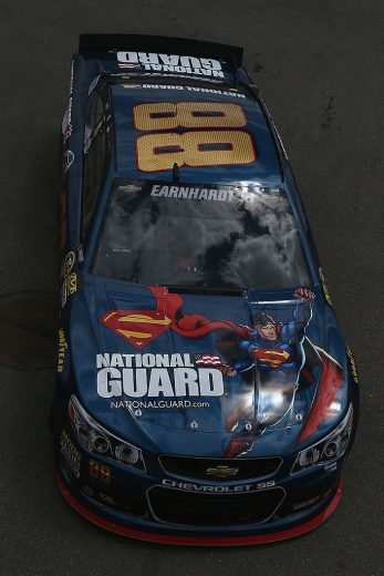 BROOKLYN, MI - JUNE 13:  Dale Earnhardt Jr., driver of the #88 National Guard/Superman Chevrolet, drives through the garage area during practice for the NASCAR Sprint Cup Series Quicken Loans 400 at Michigan International Speedway on June 13, 2014 in Brooklyn, Michigan.  (Photo by Sean Gardner/NASCAR via Getty Images)