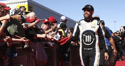 Ross Chastain walks down the red carpet at Phoenix Raceway.