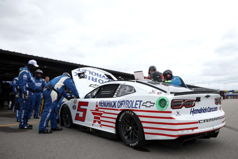DARLINGTON, SOUTH CAROLINA - MAY 08: Crew members work on the #5 Hendrickcars.com Chevrolet, driven by Kyle Larson in the garage area after an on-track incident during the NASCAR Cup Series Goodyear 400 at Darlington Raceway on May 08, 2022 in Darlington, South Carolina. (Photo by James Gilbert/Getty Images) | Getty Images