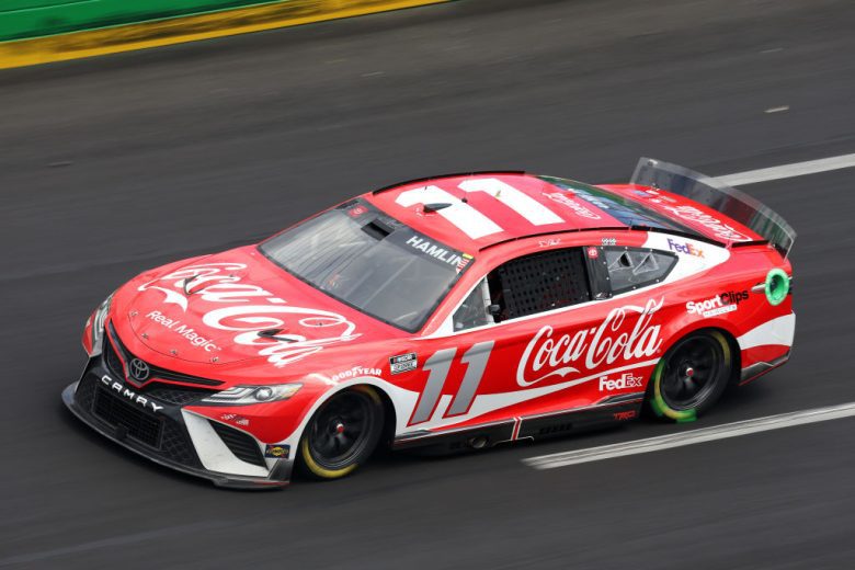 HAMPTON, GEORGIA - JULY 10: Denny Hamlin, driver of the #11 Coca-Cola Toyota, drives during the NASCAR Cup Series Quaker State 400 at Atlanta Motor Speedway on July 10, 2022 in Hampton, Georgia. (Photo by James Gilbert/Getty Images) | Getty Images