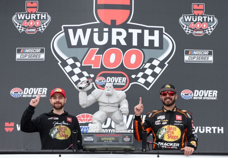 James Small (L) poses in Victory Lane with Martin Truex Jr. (R) at Dover Motor Speedway.