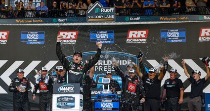 chandler smith celebrates in victory lane