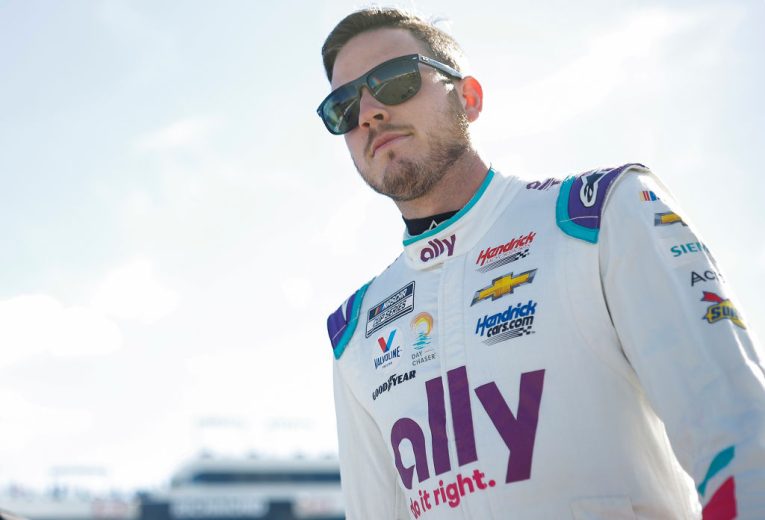 RICHMOND, VIRGINIA - AUGUST 13: Alex Bowman, driver of the #48 Ally Chevrolet, walks the griduring practice for the NASCAR Cup Series Federated Auto Parts 400 at Richmond Raceway on August 13, 2022 in Richmond, Virginia. (Photo by Jared C. Tilton/Getty Images) | Getty Images