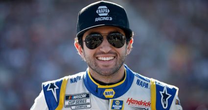 Chase Elliott smiles on pit road ahead of the 2022 NASCAR Cup Series championship race