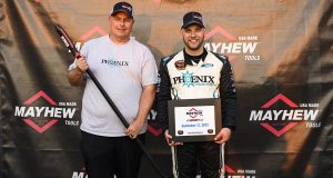Justin Bonsignore, driver of the #51 Phoenix Communications, Inc., poses for a pole award photo during the Eddie Partridge 256 for the Whelen Modified Tour at Riverhead Raceway on September 17, 2022 in Riverhead, New York. (Mike Lawrence/NASCAR)