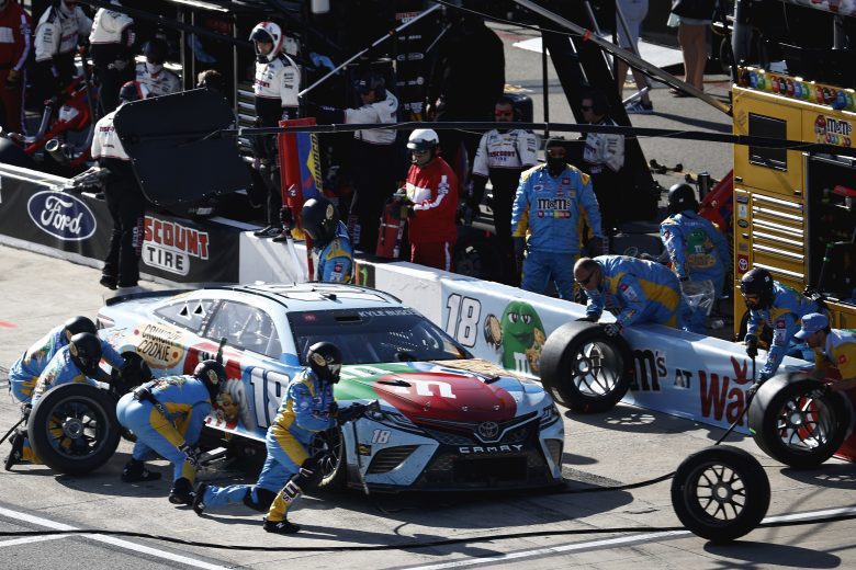 Kyle Busch makes a pit stop