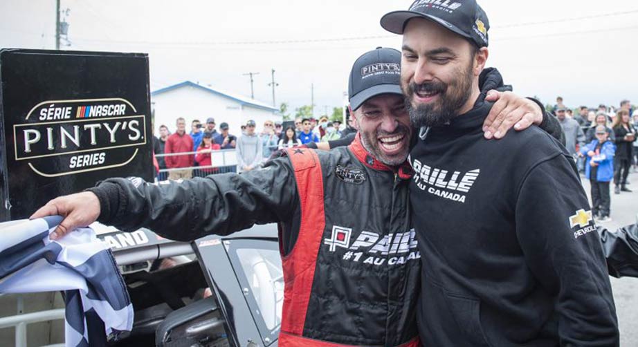 Marc-Antoine Camirand hugs crew chief, Robin McCluskey, after winning the WeatherTech 200 at Canadian Tire Motorsport Park.