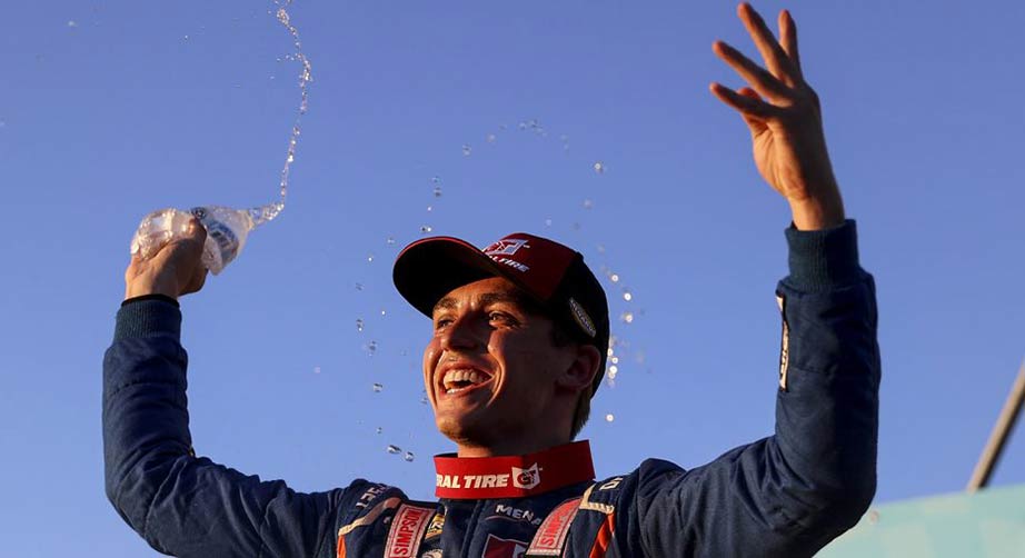 Jake Drew celebrates a victory at Portland International Raceway