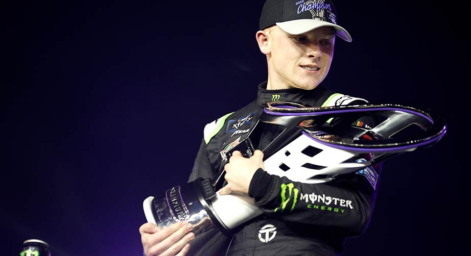 Ty Gibbs cradles the Xfinity Series championship trophy