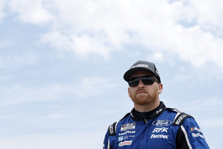 ELKHART LAKE, WISCONSIN - JULY 03: Chris Buescher, driver of the #17 Fastenal Ford, walks the grid prior to the NASCAR Cup Series Kwik Trip 250 at Road America on July 03, 2022 in Elkhart Lake, Wisconsin. (Photo by Sean Gardner/Getty Images) | Getty Images