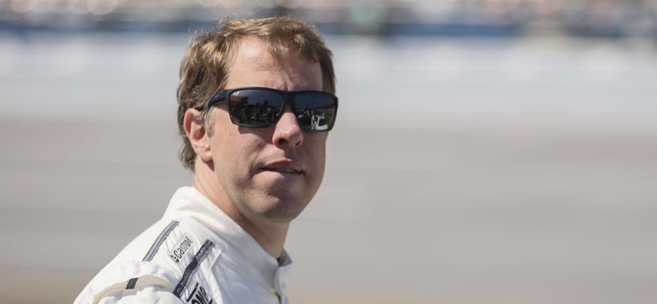 Brad Keselowski waits on the grid during qualifying.