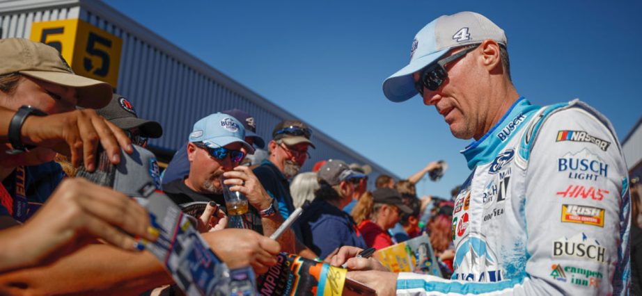 Kevin Harvick signs autographs
