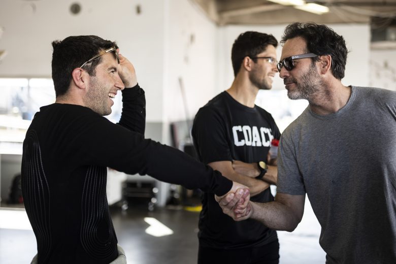 DAYTONA BEACH, FLORIDA - JANUARY 31: Mike Rockenfeller (L) meets with Jimmie Johnson (R) in the garage during the NASCAR Garage 56 Test at Daytona International Speedway on January 31, 2023 in Daytona Beach, Florida.