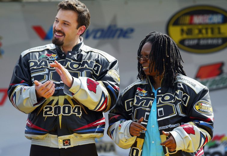 DAYTONA BEACH, FL - FEBRUARY 15: Actors Ben Affleck and Whoopi Goldberg prior to the Daytona 500 on February 15, 2004 at Daytona International Speedway in Daytona Beach, Florida. (Photo by Jamie Squire/Getty Images)