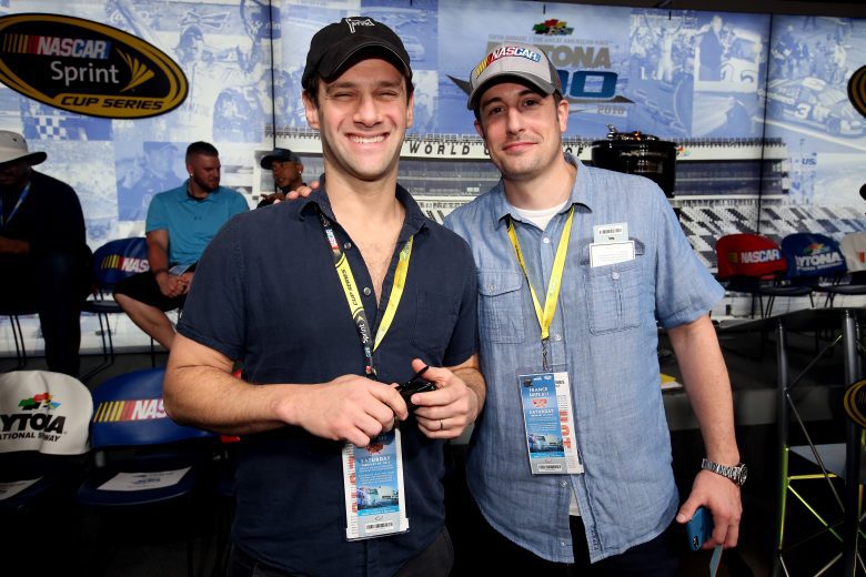 DAYTONA BEACH, FL - FEBRUARY 21: Justin Bartha poses with Jason Biggs at the driver's meeting prior to the NASCAR Sprint Cup Series DAYTONA 500 at Daytona International Speedway on February 21, 2016 in Daytona Beach, Florida. (Photo by Sean Gardner/Getty Images)