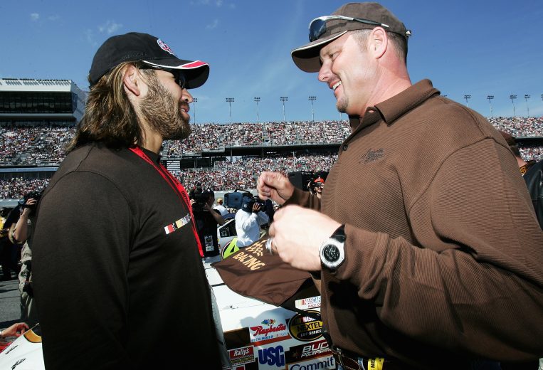 DAYTONA BEACH, FL - FEBRUARY 20: Boston Red Sox' Johnny Damon chats with Houston Astros' Roger Clemens during pre-race festivities for the NASCAR Nextel Cup Daytona 500 on February 20, 2005 at Daytona International Speedway in Daytona Beach, Florida. (Photo by Jonathan Ferrey/Getty Images)