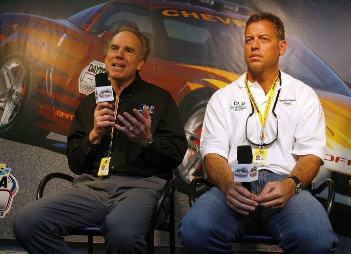 DAYTONA BEACH, FL - FEBRUARY 19: Former Dallas Cowboy quarterbacks Roger Staubach (L) and Troy Aikman answer questions during a press conference before the NASCAR Nextel Cup Series Daytona 500 on February 19, 2006 at Daytona International Speedway in Daytona Beach, Florida. (Photo by Rusty Jarrett/Getty Images)
