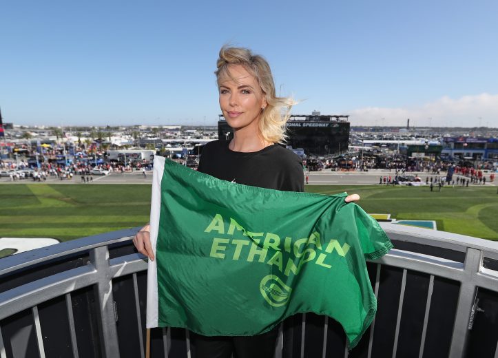 DAYTONA BEACH, FL - FEBRUARY 18: Actress Charlize Theron poses with the green flag prior to the start of the Monster Energy NASCAR Cup Series 60th Annual Daytona 500 at Daytona International Speedway on February 18, 2018 in Daytona Beach, Florida. (Photo by Sean Gardner/Getty Images)