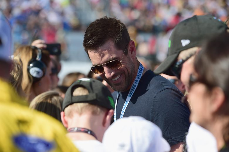 DAYTONA BEACH, FL - FEBRUARY 18: Aaron Rodgers, quarterback for the Green Bay Packers, stands on the grid prior to the Monster Energy NASCAR Cup Series 60th Annual Daytona 500 at Daytona International Speedway on February 18, 2018 in Daytona Beach, Florida. (Photo by Jared C. Tilton/Getty Images)