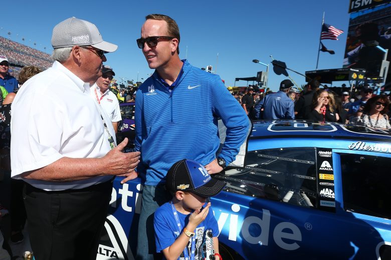 DAYTONA BEACH, FL - FEBRUARY 18: Team owner Rick Hendrick talks to Two-time Super Bowl winning quarterback Peyton Manning on the grid prior to the Monster Energy NASCAR Cup Series 60th Annual Daytona 500 at Daytona International Speedway on February 18, 2018 in Daytona Beach, Florida. (Photo by Sarah Crabill/Getty Images)