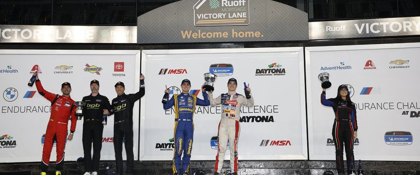 The Michelin Pilot Challenge podium celebrates in Victory Lane