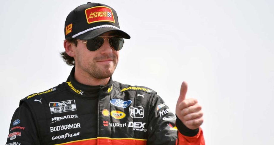 Ryan Blaney gives the thumbs-up sign while wearing Advance Auto Parts fire suit