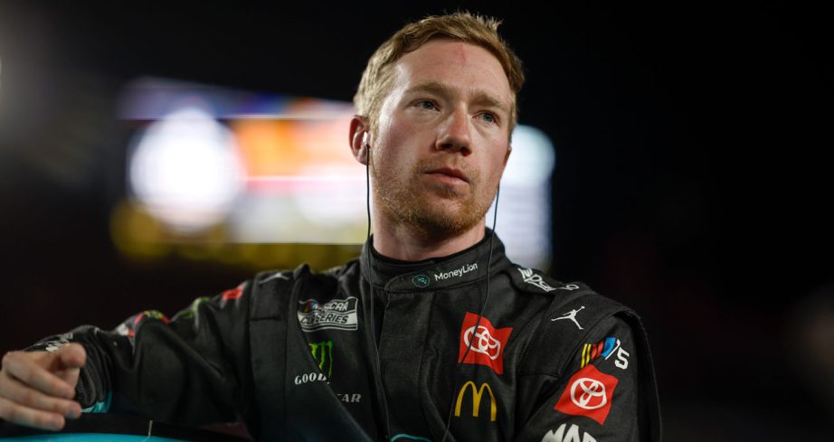 Tyler Reddick stares off after exiting his No. 45 Toyota