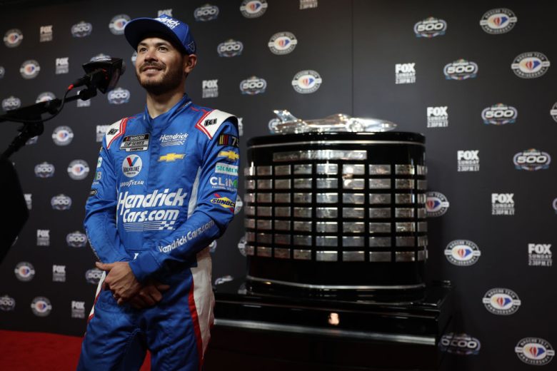 Kyle Larson speaks to the media