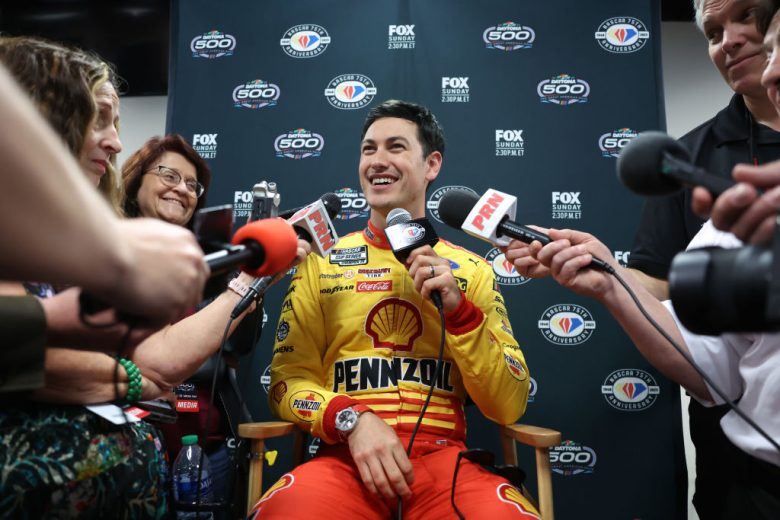 Joey Logano speaks to the media