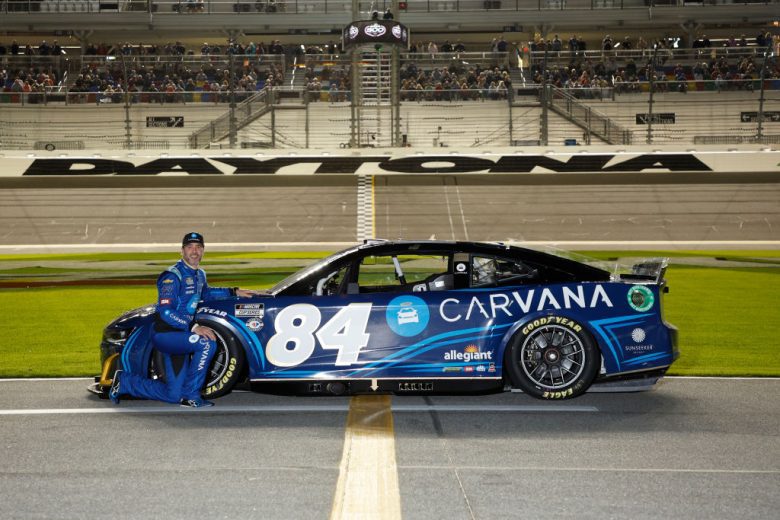 Jimmie Johnson poses on track