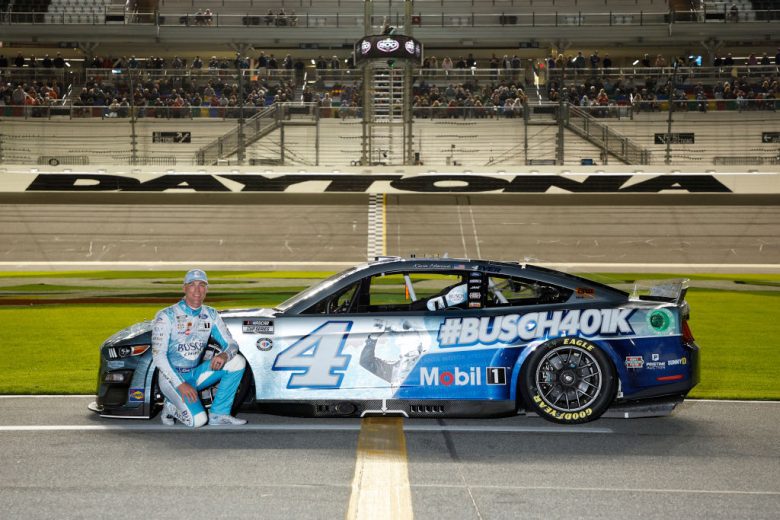 Kevin Harvick poses on track