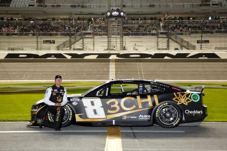Kyle Busch poses on track