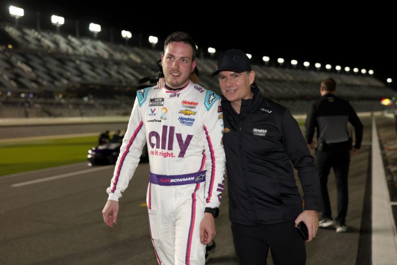 Alex Bowman and Jeff Gordon celebrate on pit road