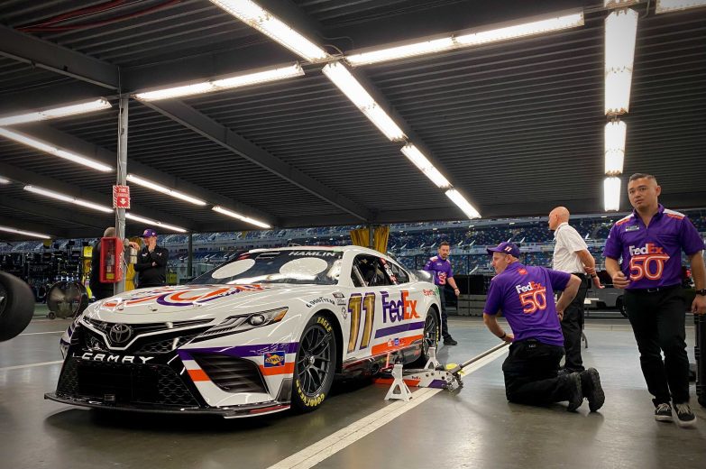 Denny Hamlin's car goes through inspection