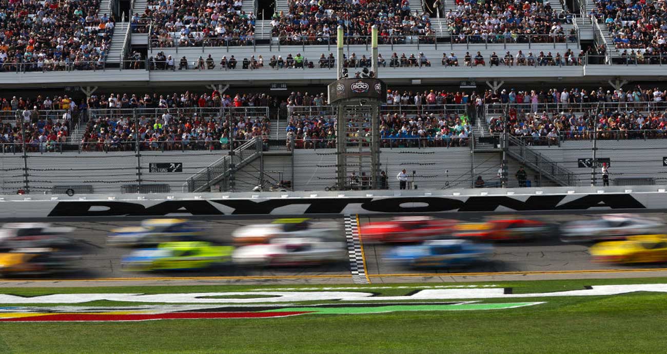 Cars are a blur as they whiz past the start-finish line during the Daytona 500 in 2023.