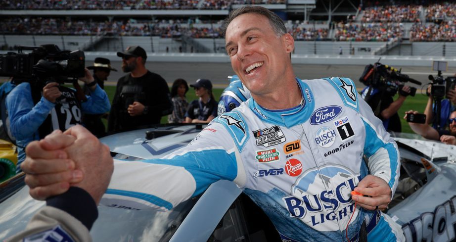 Kevin Harvick greets a crewman ahead of the 2023 Daytona 500